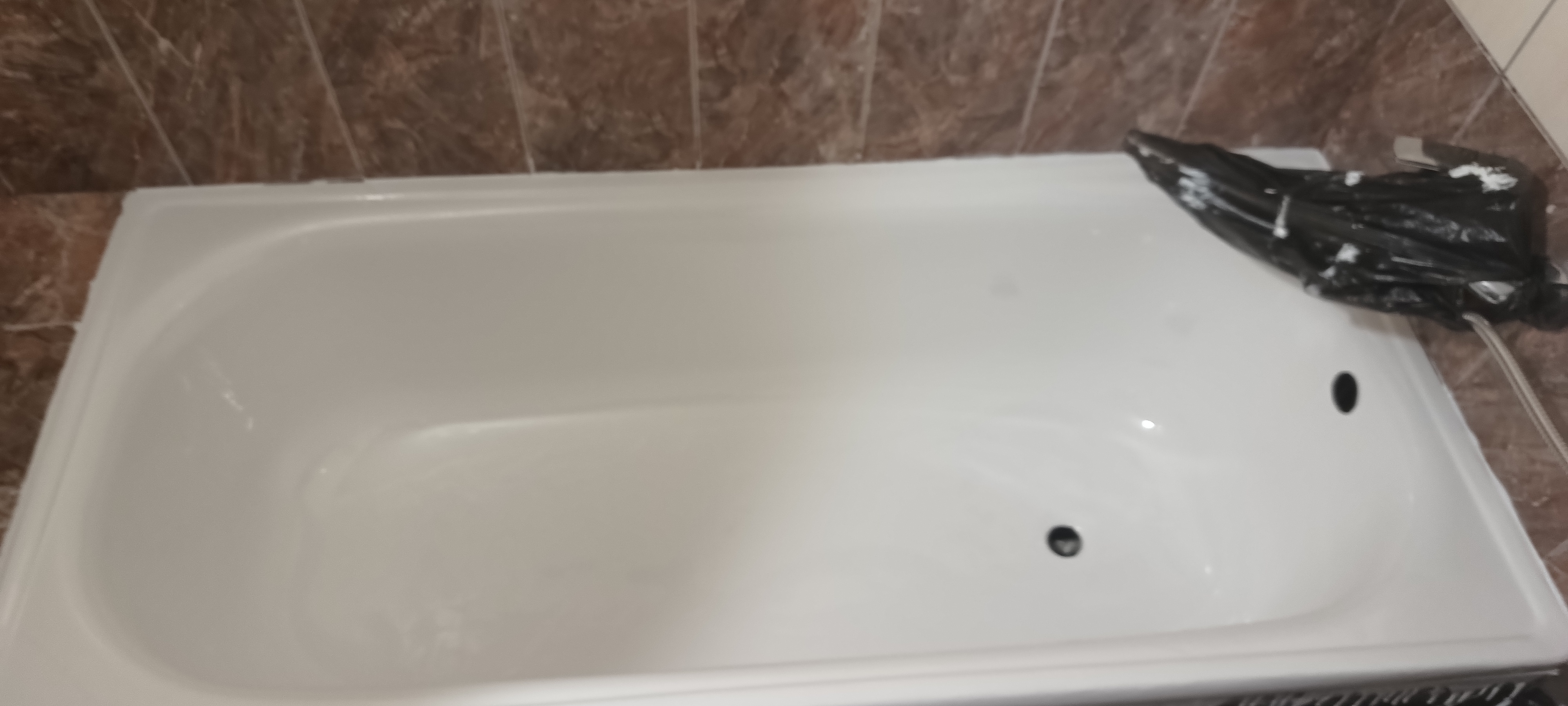 Чавунна ванна після реставрації